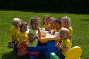 This summer, the weather has been nice enough for children to have snack outside. It's a picnic gathering for everyone!